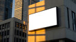 © Fadel - Blank digital billboard on the side of a modern building during golden hour