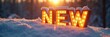 © val - Brightly lit 'new' sign in snow, capturing the warmth of sunlight in a winter landscape.