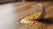 © antuanetto - Golden corn cereal spilled from a white bowl on a polished wooden floor, illustrating a daily household mess concept