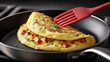 © sabyna75 - Cooking breakfast omelet in skillet with spatula for kitchen and culinary concepts