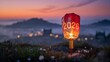 © Barson - glowing red Chinese lantern floating over foggy landscape at sunset 2026