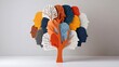 © TesaI - Diverse human faces forming a conceptual tree representing global community, unity, and interconnected people