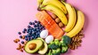 © Jahid - Healthy food assortment featuring salmon avocado blueberries bananas broccoli nuts and eggs