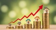 © Artfinity - Real estate market and housing price growth represented by miniature houses on coin stacks. Investment, finance, and mortgage concept with increasing value. Small houses arranged with a rising
