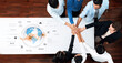 © InfiniteFlow - Diverse team members come together to symbolize collaboration and innovation in the digital age, emphasizing teamwork and strategic discussions around ideas and insights. Trope