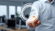 © Yuliia - Businessman touching glowing circular hologram interface in modern office environment. Digital technology concept for business innovation.