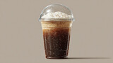 A refreshing cold coffee with foam in a transparent plastic cup, showcasing its layers