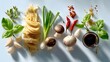 © Shaggy - Assortment of fresh asian cooking ingredients including pasta, mushrooms, garlic, scallions, basil, and chili peppers on a light blue surface