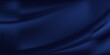 © elliyatun - Navy blue silk satin. Silky shiny fabric. Dark luxury background with space for design. Banner. Wide. Long. Panoramic. Template. Empty. Flat lay, top view table. Beautiful.Elegant.Birthday,Christmas.