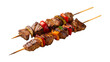 © kazi - Deliciously grilled juicy meat and vibrant vegetable skewers presented elegantly against a dramatic dark background