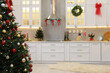 © New Africa - Stylish kitchen with Christmas decor. Interior design
