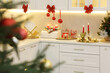 © New Africa - Christmas decor and sweets on countertop in kitchen. Interior design