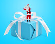 © New Africa - Santa Claus on big gift box against light blue background