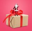 © New Africa - Santa Claus with bag on big gift box against pink background