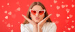 © Pixel-Shot - Beautiful young woman in stylish heart-shaped sunglasses on color background