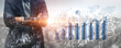 © InfiniteFlow - A professional businessman stands confidently with arms crossed in front of a city skyline, showcasing financial growth data through graphs and charts. Scalp