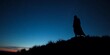 © Chalermrach - Mysterious figure in silhouette beneath a starry sky, evoking folklore and tales,  silhouette,  spirit
