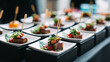© Maksim Shebeko - Close-up view of exquisite small food dishes artfully arranged for a special event celebration Generative AI