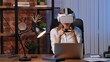 © kinomaster - Woman Engaged in Virtual Reality Gaming at Desk