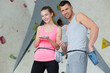 © auremar - couple preparing for wall climbing