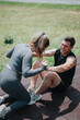 © qunica.com - Two people enjoying an active moment while exercising together outdoors.
