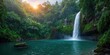© The 2R Artificiality - Lush jungle with cascading waterfall under rising sunlight, highlighting vibrant green foliage