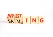 © Dzmitry - Investing and saving symbol. Concept words Saving to Investing on beautiful wooden cubes. Beautiful white table white background. Business, investing and saving concept. Copy space.