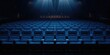 © TheWaterMeloonProjec - Unoccupied blue theater seats in a movie hall, used for seating arrangement and venue setup