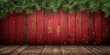 © Rizvan - Festive wooden backdrop with Christmas garland and tree branch, holiday celebration scene