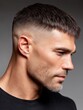 © SerPak - Close-up portrait of a man showcasing a stylish fade haircut and facial stubble. Modern grooming and hairstyle concept.