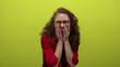 © Krakenimages.com - Woman laughing joyfully against a vibrant yellow background wearing red shirt and glasses showcasing happiness and emotion