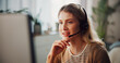 © SnapK/peopleimages.com - Smile, woman and headset with computer in home for customer service, crm and assistance. Female person, remote work and pc for technical support, helping client and representative for sales inquiry