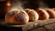 © Maryna - Freshly baked bread rolls with flaky crust on a wooden serving board