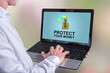 © thodonal - Money protection concept on a laptop