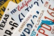 © mehaniq41 - Old US car license plates with various state names close up. Concept of driving in United States. Reaching a car registration