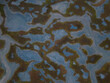 © AmazingAerialAgency - Aerial view of an intricate network of waterways weaving through marshland, creating a mosaic of blues and greens from above, Duxbury, Massachusetts, United States.