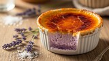 Close up of creme brulee dessert with lavender ingredients on wooden surface