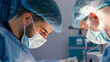 © wedmoments.stock - Two male surgeons in blue surgical attire and masks are focused on a medical procedure, showcasing teamwork and precision in a modern operating room environment