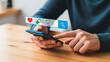 © Creative mind - Man searching for healthcare on a smartphone, concept of telemedicine and online medical help.