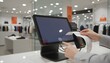 © Husen - Customer using a modern touch screen point of sale system for payment with receipt printing in a retail store