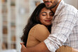 © Home-stock - Happy Indian couple in love hugging, cuddling at home, woman closing eyes and smiling, enjoying tender moment with husband