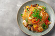 © marini - Thai Yam Woon Sen salad with glass noodles and seafood, vibrant colors, top-down view