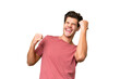 © luismolinero - Young handsome caucasian man over isolated background celebrating a victory