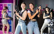 © JackF - Two woman in the special vests holding laser guns and playing laser tag with girlfriends on the bachelorette