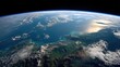 © mila103 - A beautiful view of the Earth from space. The sky is filled with clouds and the ocean is visible in the distance. Concept of awe and wonder at the vastness of the universe