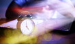 © alexkich - Alarm clock on the table. Time concept. Being late for work and school.