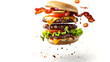 © Svetlana - Deconstructed cheeseburger with flying ingredients showcasing fresh layers for food art and design