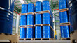 © supakitmod - Warehouse stocked with numerous blue steel drums, barrels tank, which are containers used for shipping bulk cargo. chemical storage, warehouse management