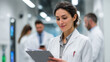 © เพ็ญพักตร์ วงกระต่าย - Focused female scientist in a white lab coat meticulously analyzes data on a clipboard in a modern pharmaceutical research facility