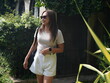 © sittinan - woman enjoy travel in weekend